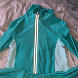 teal zip-up jacket